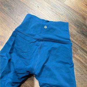 Like new blue wunder under leggings size 4